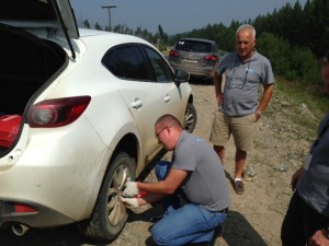 Danny overseas the wheel change. Using the art of delegation, perfected at his dealership, superbly. 