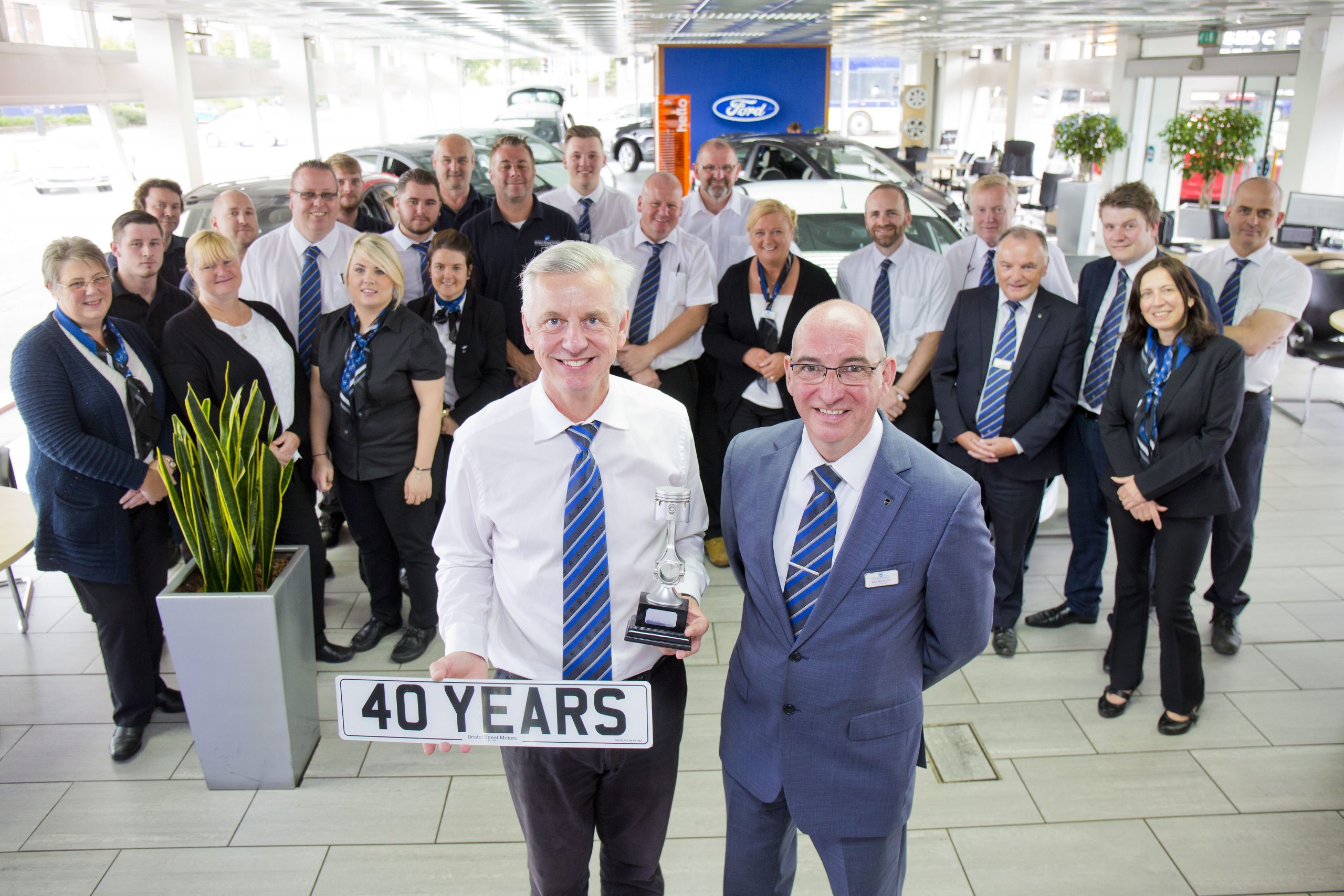 Bristol Street Motors celebrates colleague's 40 years at Bolton