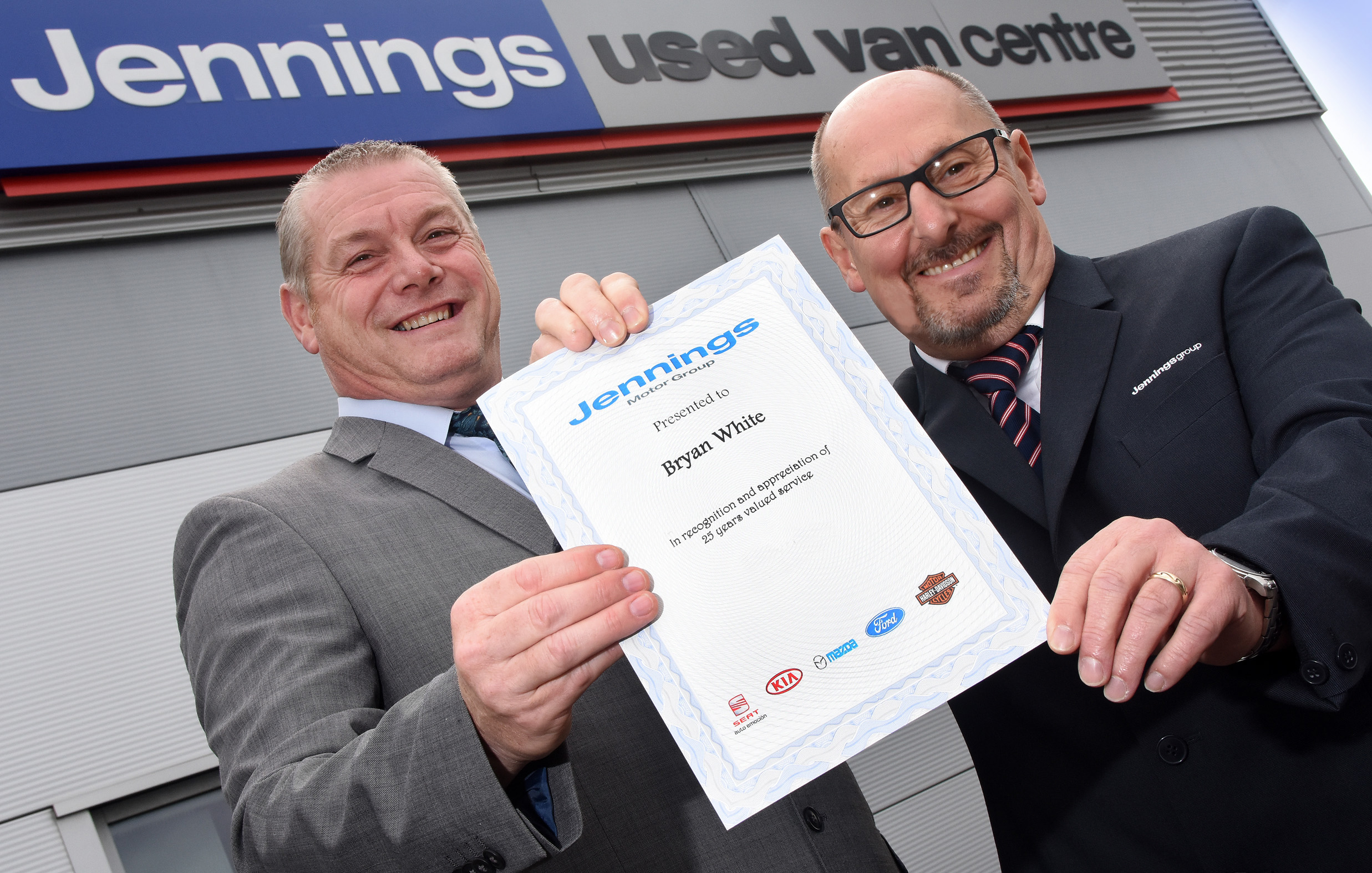 Bryan honoured for reaching 25year milestone with Jennings Car