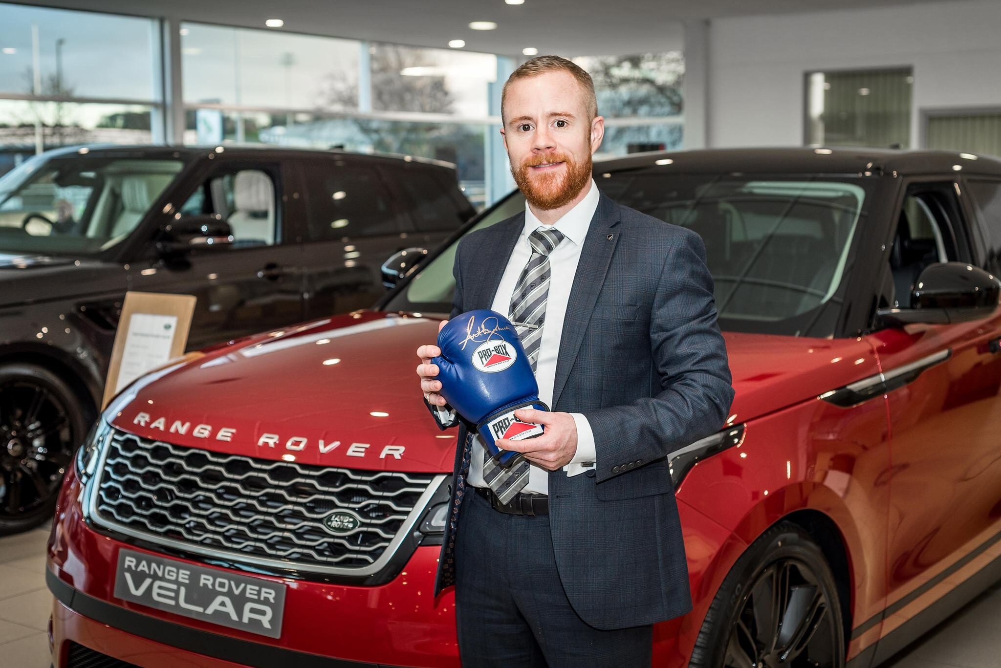 Anthony Joshua boxing glove and Premier League football shirts help