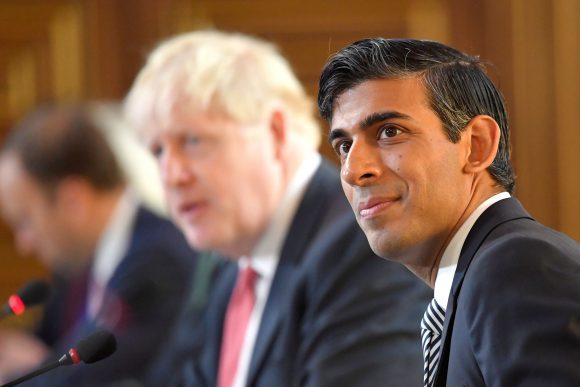 Boris Johnson and Rishi Sunak. The Government extended furlough from the end of October 2020. One in eight workers were furloughed on December 31.