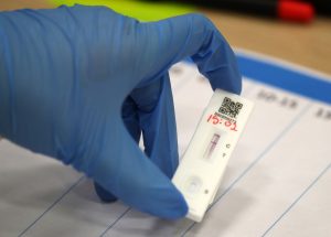 Lateral flow testing device for Covid-19