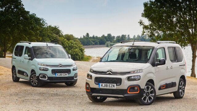 Citroen Berlingos parked up near a lake