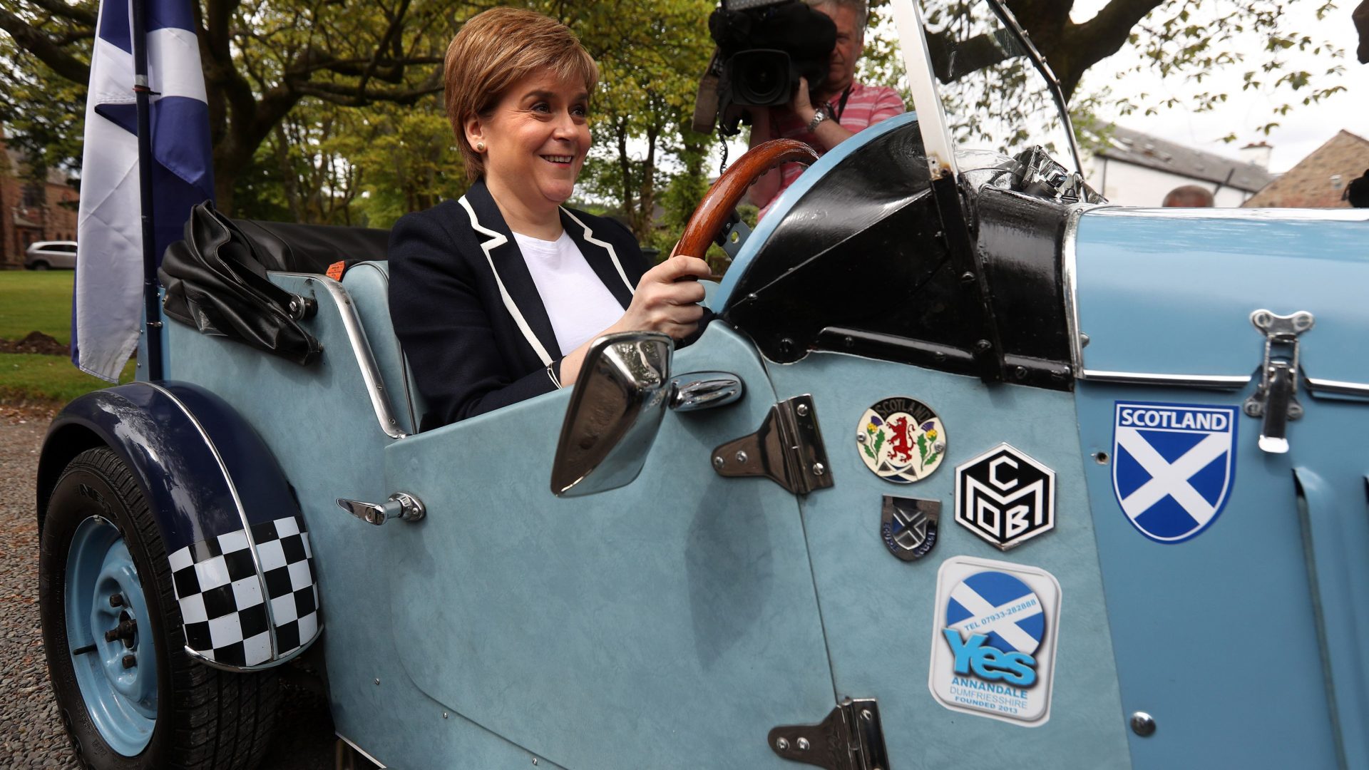 Nicola Sturgeon in a classic car