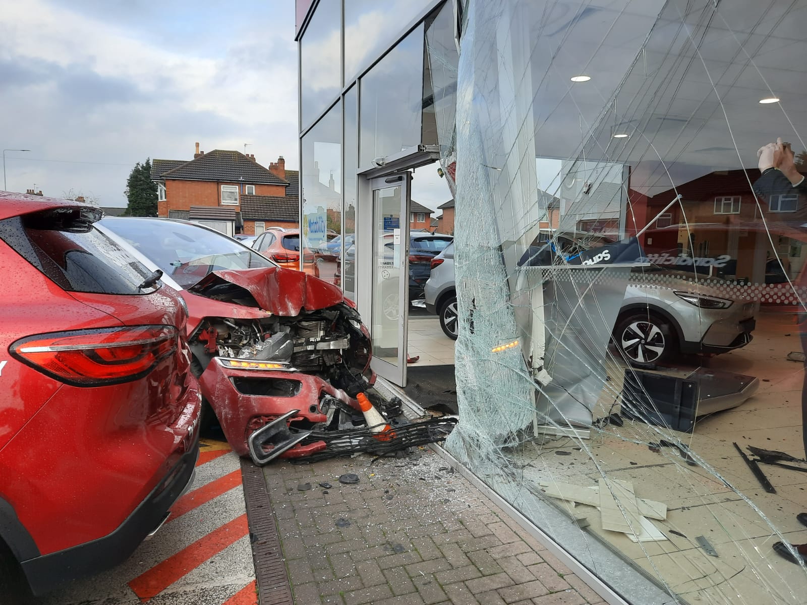 Video: Citroen smashes into the front of car dealership showering sales ...