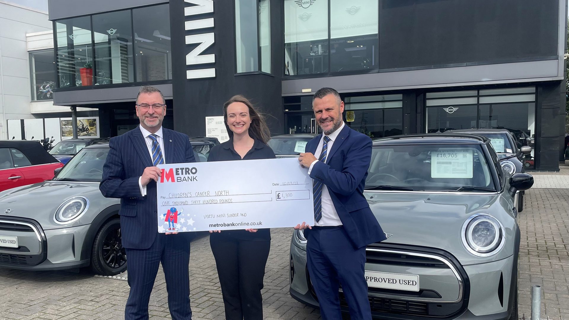 Jeff Aynsley and Anthony Wheatley from Vertu Mini Sunderland with Emma Carson from Children’s Cancer North