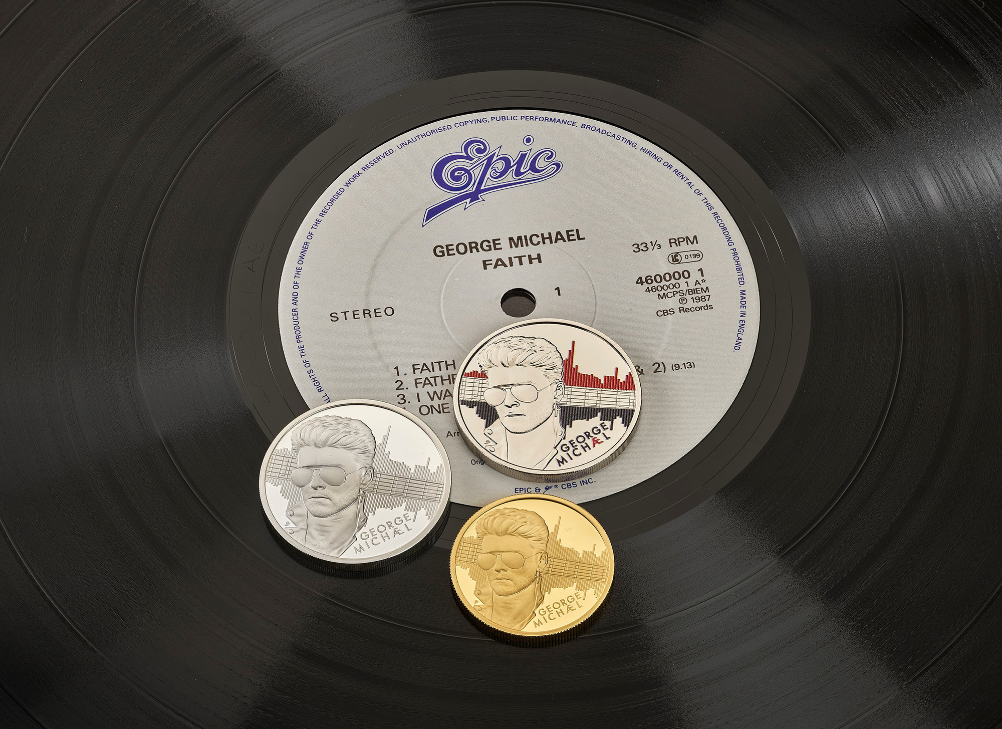 George Michael coins via PA