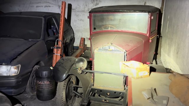 Abandoned dealership in France, with vintage car