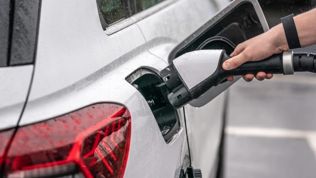 Electric car being charged, via PA