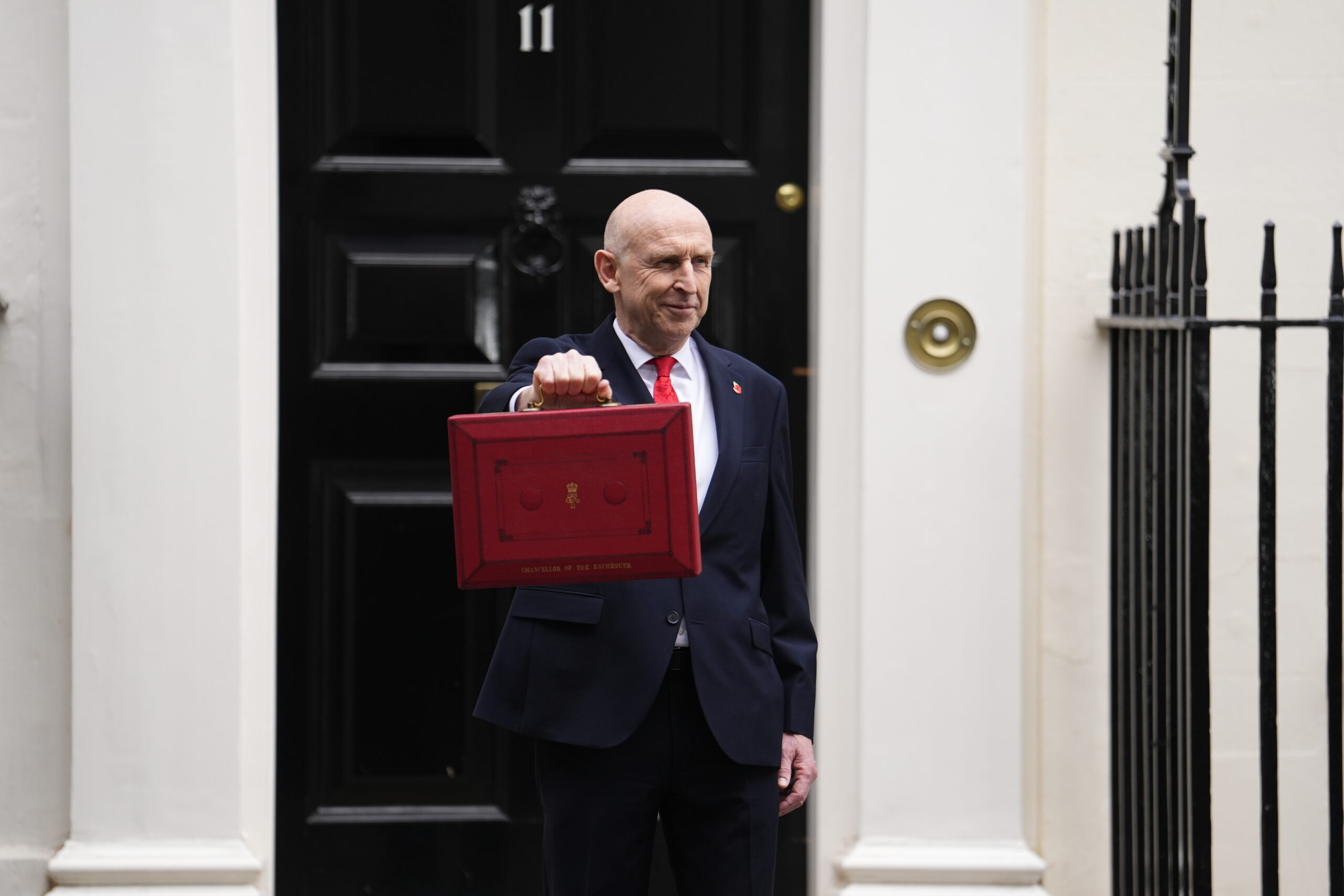 Fuel duty freeze extended but car dealers face higher wage bills as Chancellor unveils Autumn Budget